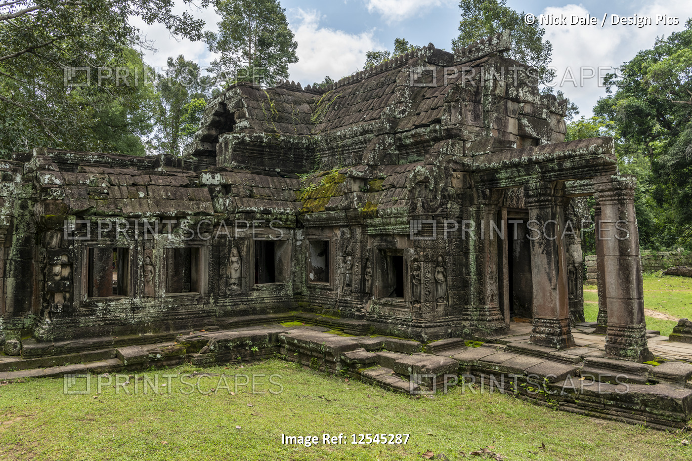 Ruined stone temple with columns, Angkor Wat; Siem Reap, Siem Reap Province, ...